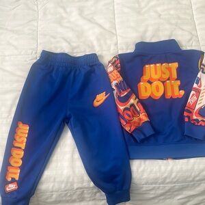 Nike track suit for a toddler sz 18 months worn one time.  Very good condition.